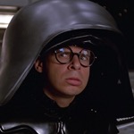 Rick Moranis as a Darth Vader-type villian. Can you imagine? LOL that's so RANDOM