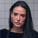 Demi Moore preparing to cover herself in monster gunk in The Substance